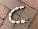 Perler på en snor - Beige marmor  -	Litt Mye Tilbehør - Strikkefeber - Garntopia