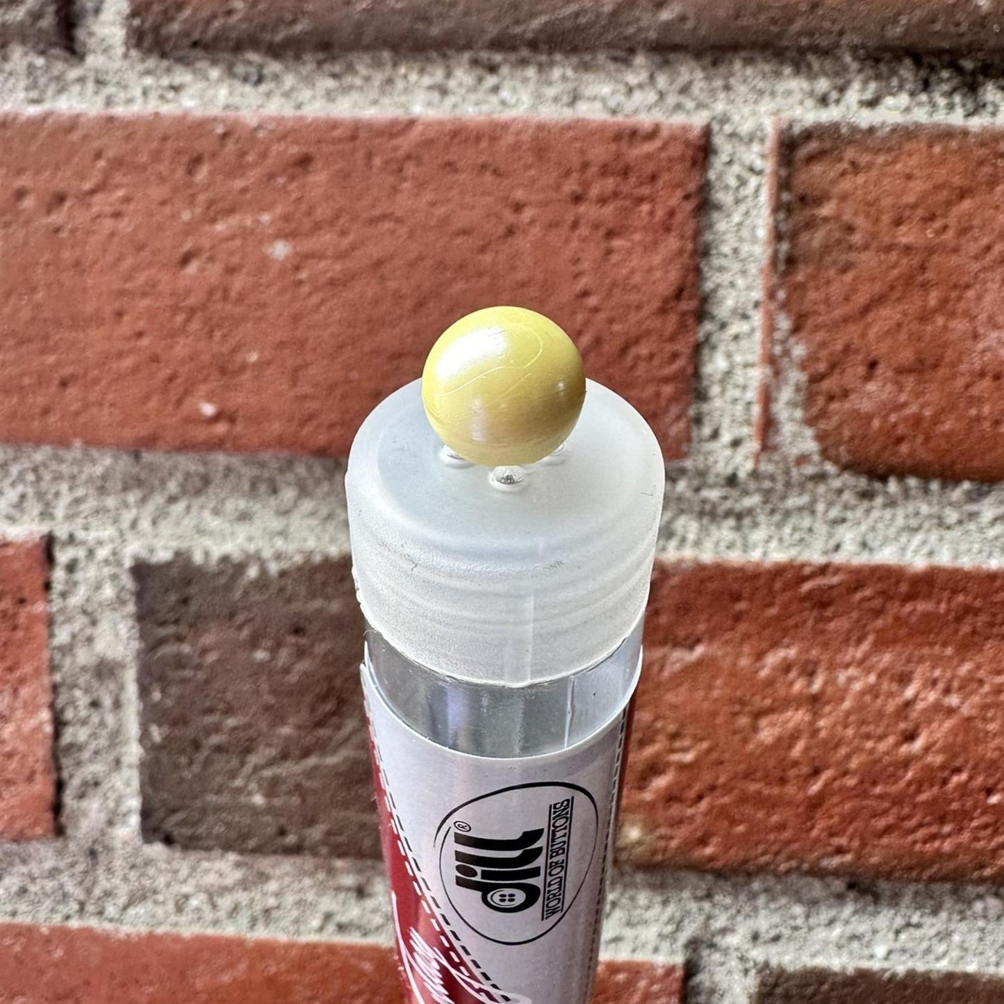 Rund perleknapp i plast - lys gul- 10 mm - Hjelmtvedt - Garntopia